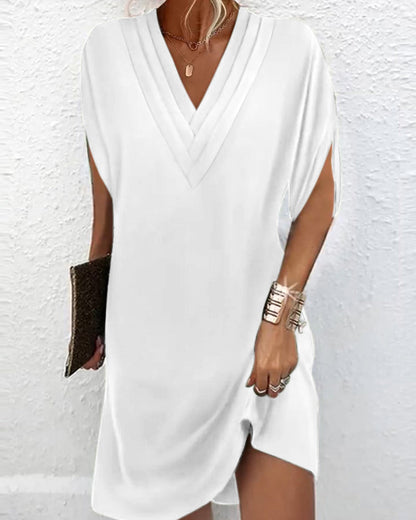 Elegant dress with plain-coloured split sleeves