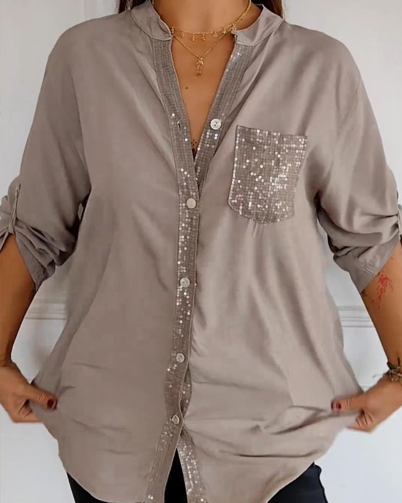 Casual top with sequin inserts and buttons