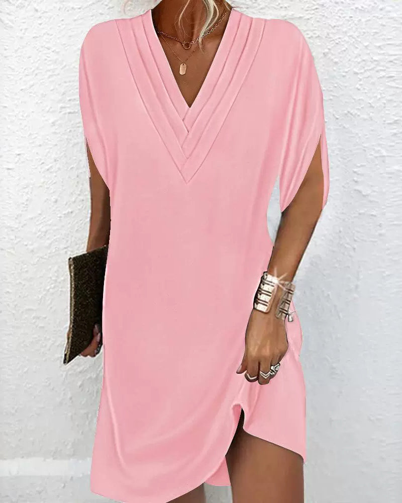 Elegant dress with plain-coloured split sleeves